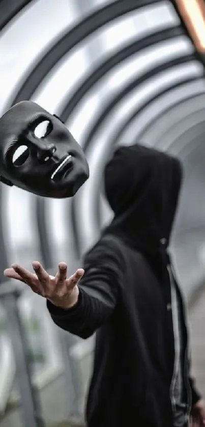 Floating black mask in a futuristic tunnel setting.