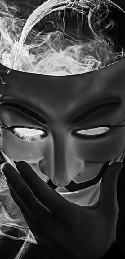 Mysterious mask with smoke in black and white.