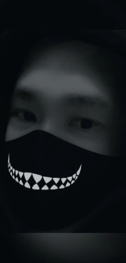 Mysterious monochrome wallpaper featuring a darkly masked face with a mysterious smile.