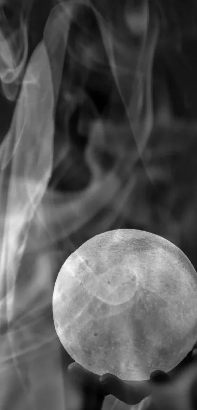 Mysterious figure holding a glowing moon.