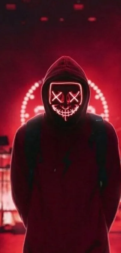 Hooded figure with neon lights on a red background.