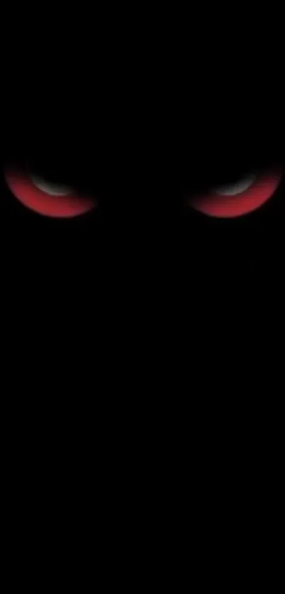 Dark wallpaper with glowing red eyes.