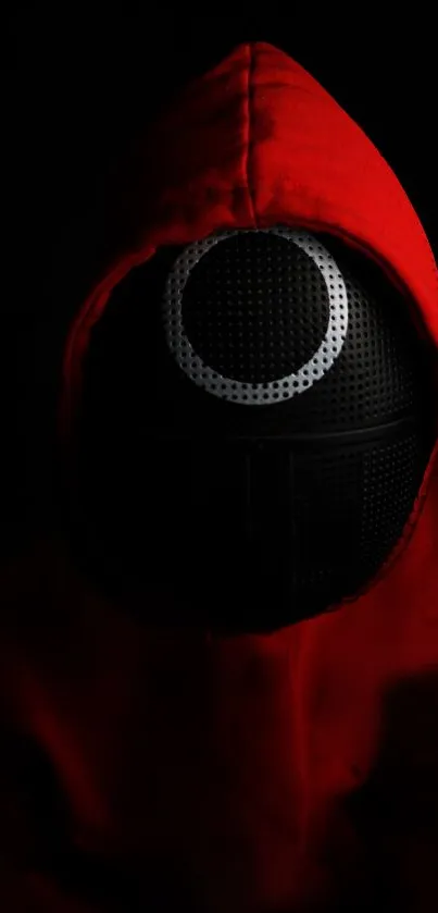 Mysterious red hooded figure in the dark. Striking design for mobile wallpaper.