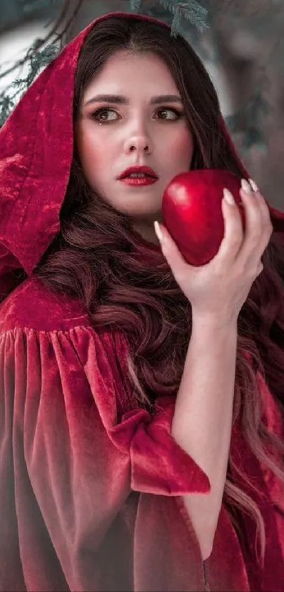 Woman in red hood holding an apple, with a mysterious forest background.