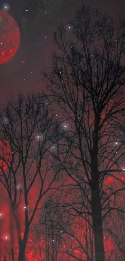 Mysterious red moon night with bare trees and stars.