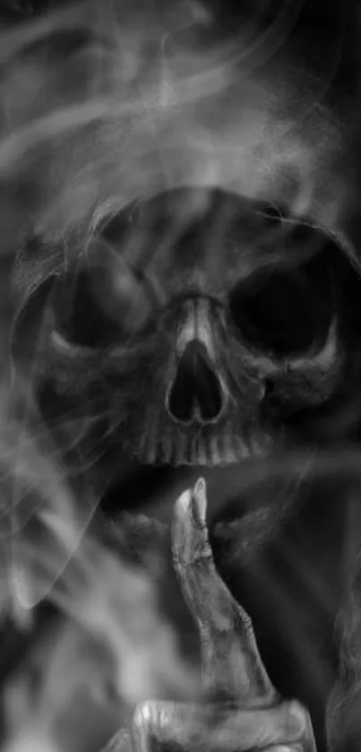 Mysterious black and grey skull wallpaper with smoke effect.