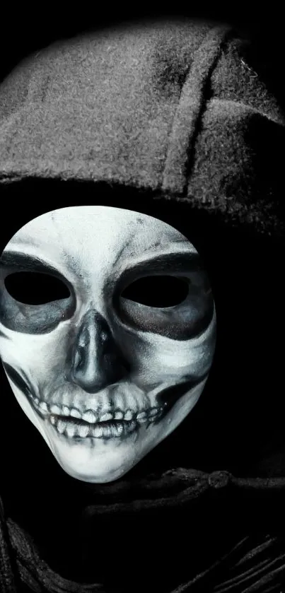 Mysterious skull mask under a dark hood.