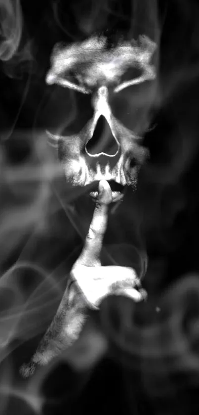 Mysterious smoky skull art on black background wallpaper.