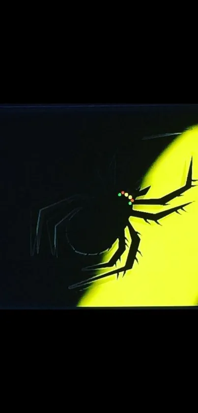 Silhouette of a spider in dark contrast with yellow background glow.