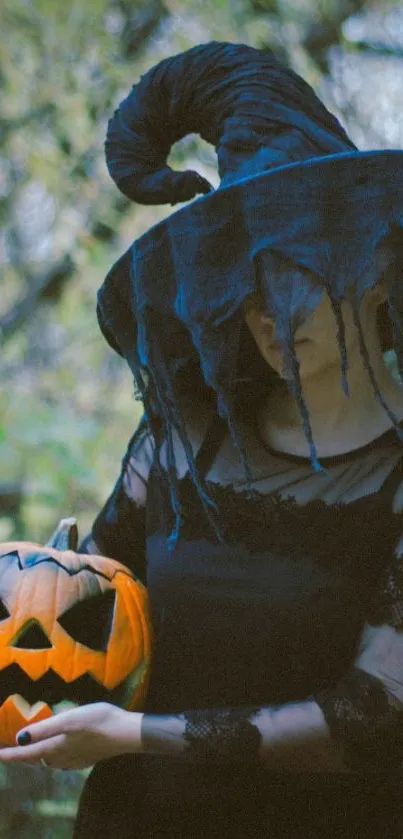 Witch in a dark forest holding a carved pumpkin.