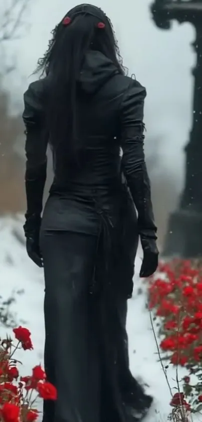 Woman in black dress walking through snowy garden with red roses.