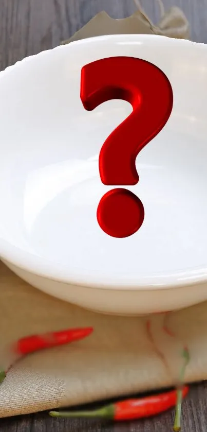 3D red question mark above a white bowl, set on a rustic wooden table with red chilies.