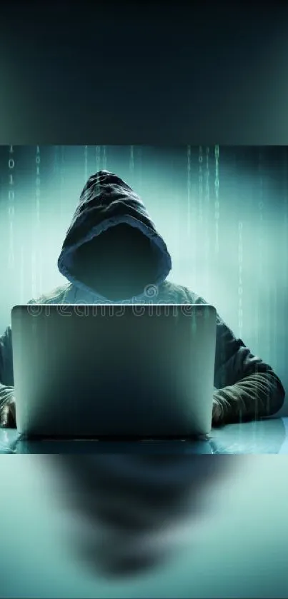 Hacker with hood in front of laptop, digital code background.