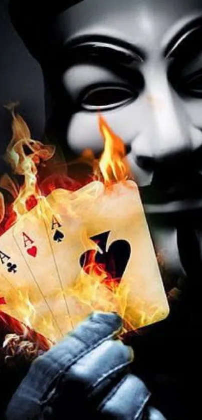 Anonymous mask with fiery playing cards.