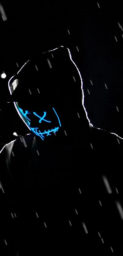 Silhouette with neon mask in dark setting, creating mysterious vibe.