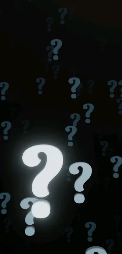 Mystery-themed wallpaper with glowing question marks on a dark background.