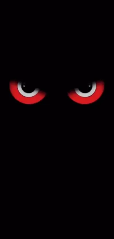 Dark wallpaper with glowing red eyes.