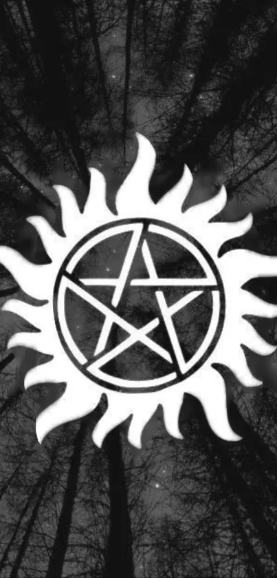 Mystic sun with pentagram in monochrome forest background.