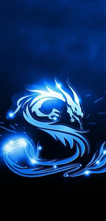 Glowing blue dragon on dark background wallpaper.