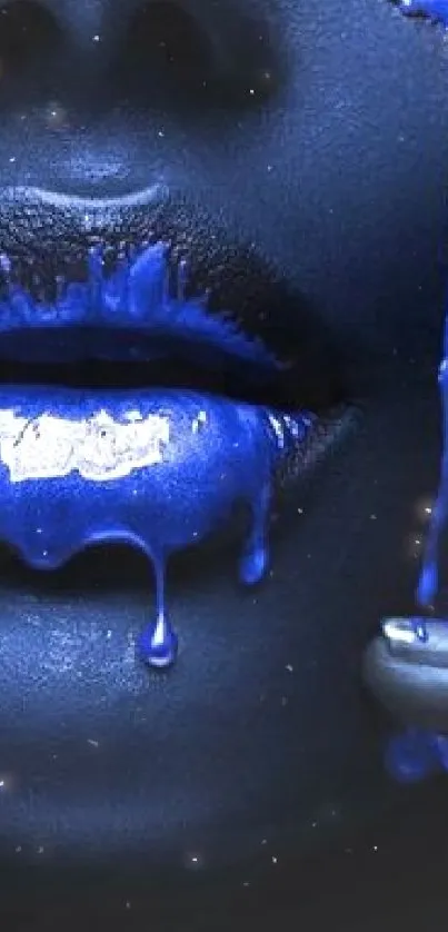 Close-up of face with blue paint drips on lips and fingers.