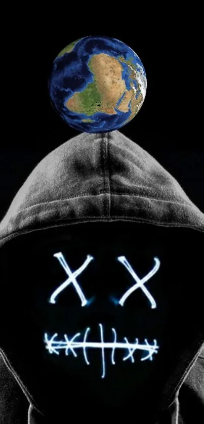 Hooded figure with glowing face and Earth above in dark wallpaper.