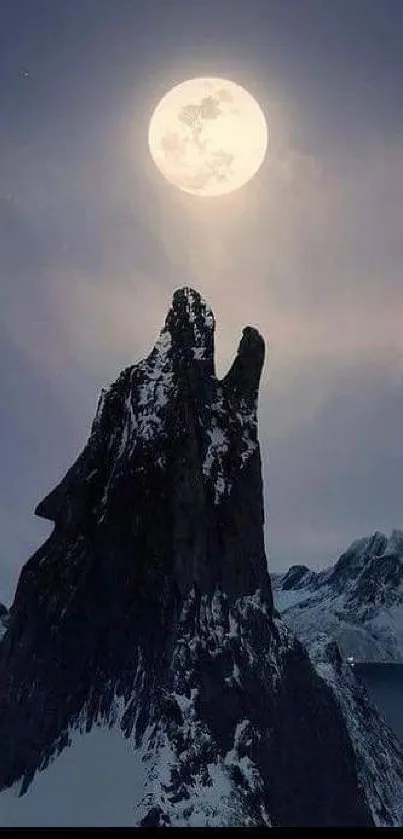 Dark mountain peak under a glowing full moon with a tranquil night sky.