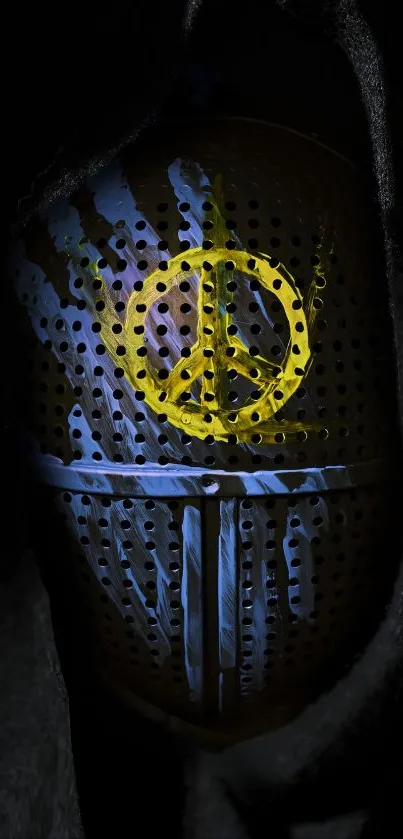 A mysterious helmet with a yellow peace symbol spray-painted on it.