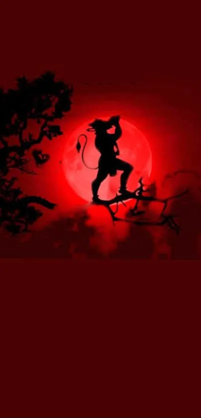 Silhouette against a red moon wallpaper.