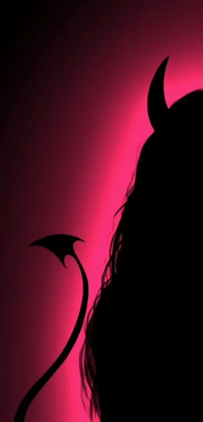 Silhouette of a figure with horns in pink glow.