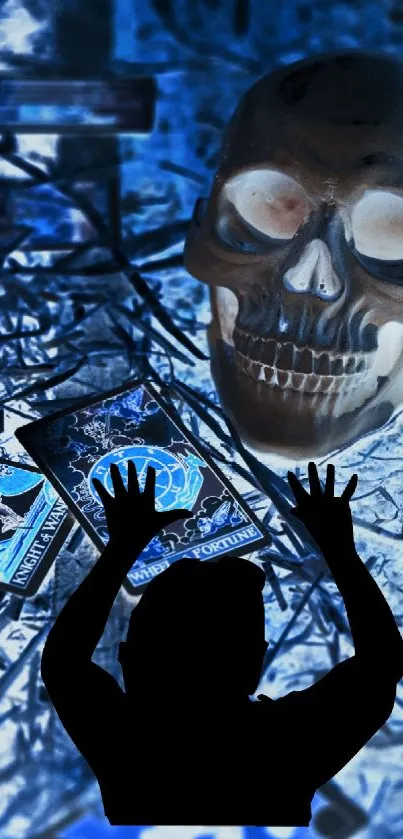 Mystical skull with tarot cards and silhouette in blue tones wallpaper.