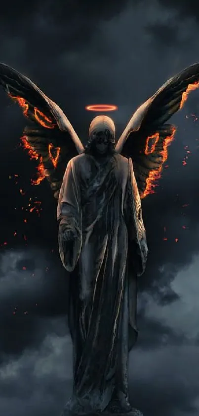 Mystical angel with fiery wings in dark cloudy background.