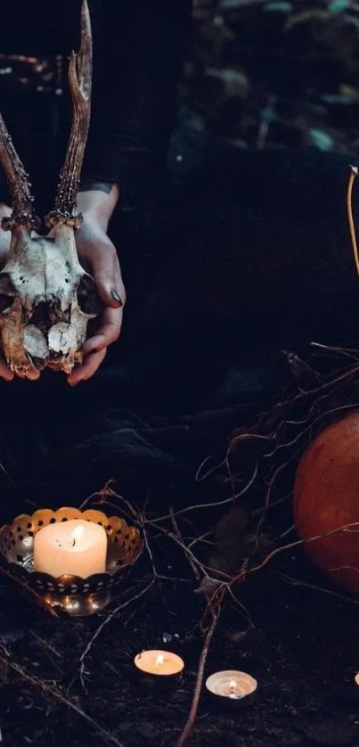 Dark autumn scene with candles and skull.