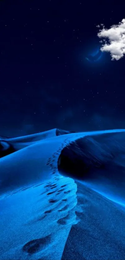 Blue desert under starry sky with footprints and colorful sand dunes.