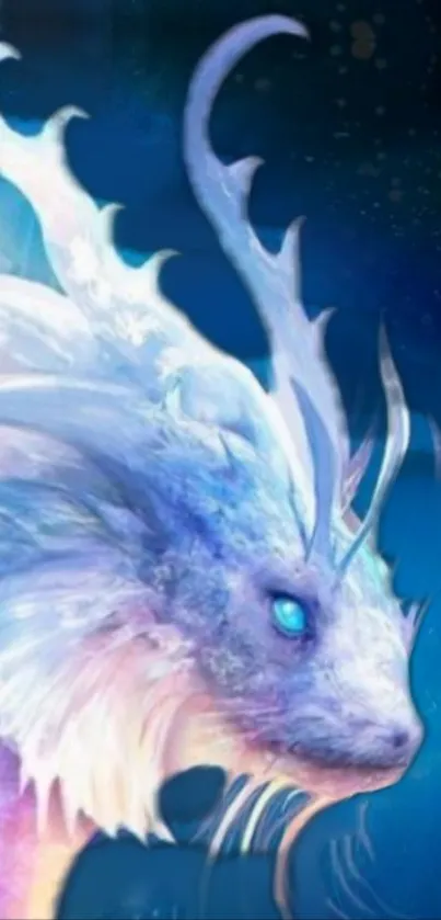 Mystical blue dragon with glowing eyes on a fantasy-themed wallpaper.