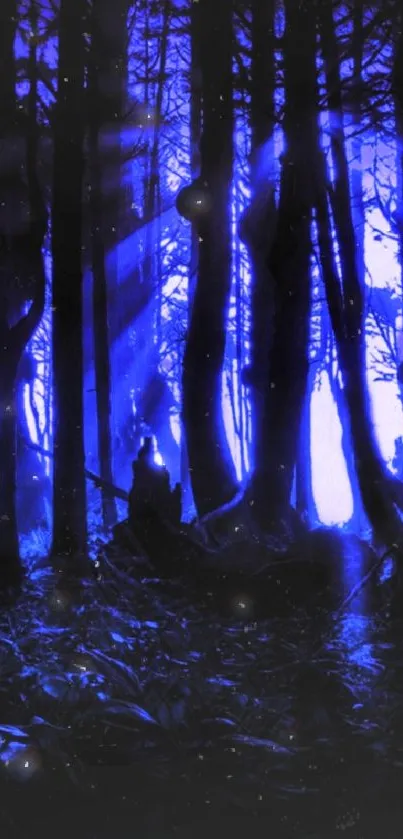 Mystical blue forest wallpaper with silhouetted trees and glowing ambiance.