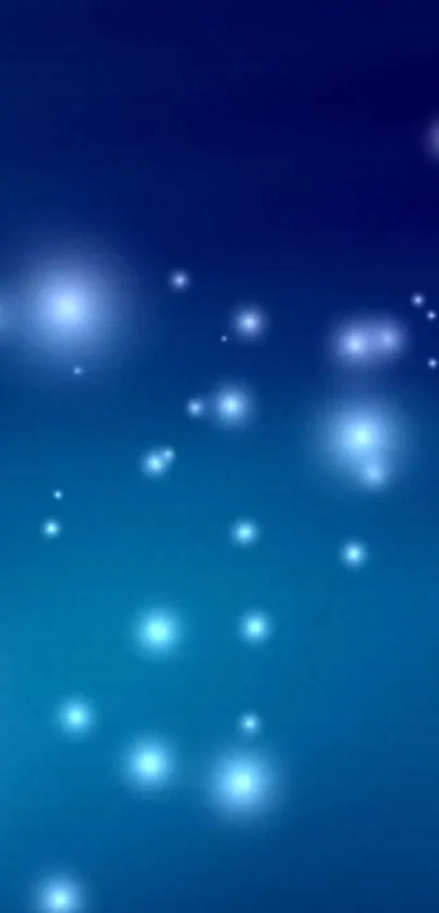 Mystical blue light wallpaper with glowing spots