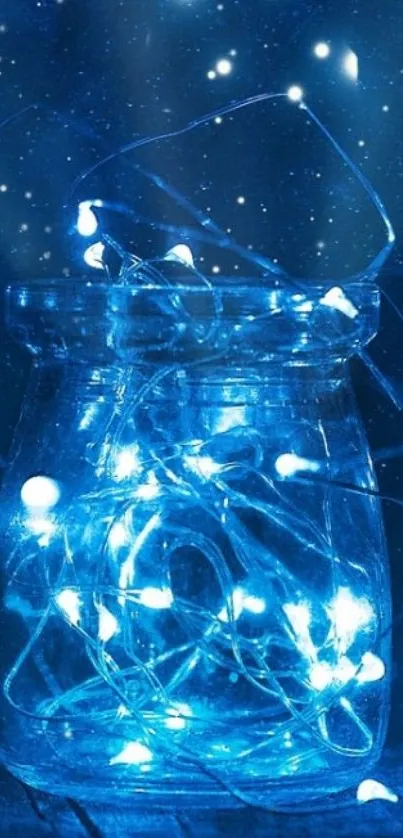 Glowing blue fairy lights in a jar with starry background.