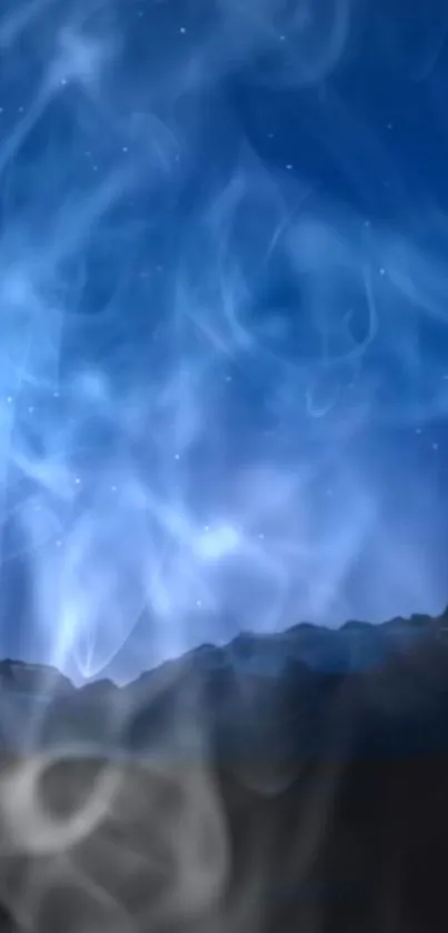 Mystical blue night sky with swirling smoke and mountains.