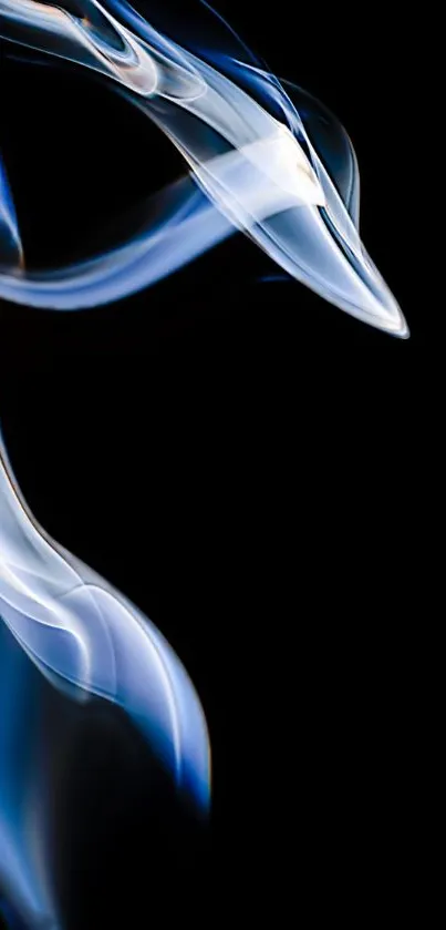 Mystical blue smoke swirls on a black background, creating an elegant wallpaper.