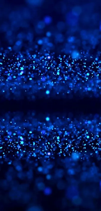 Mystical blue sparkle wallpaper with shimmering light effects.