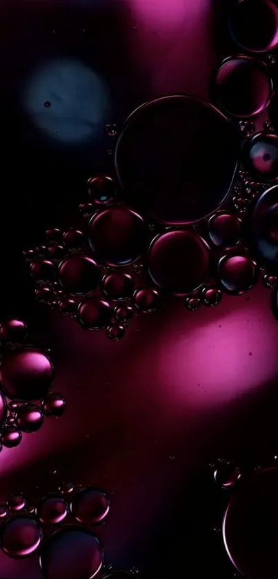 Deep magenta and black bubbles forming an abstract mobile wallpaper.