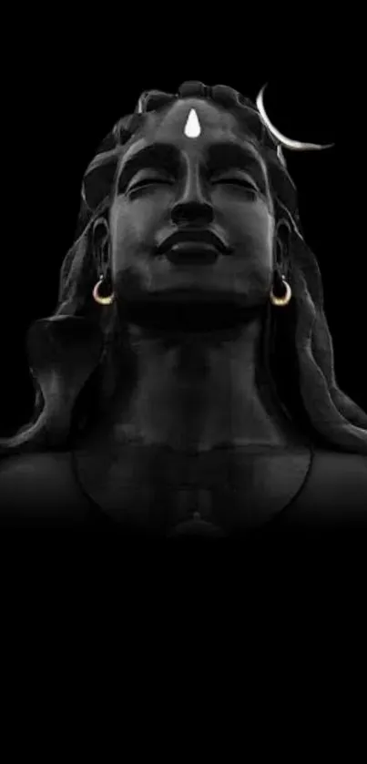 Mystical statue of Shiva in dark wallpaper.