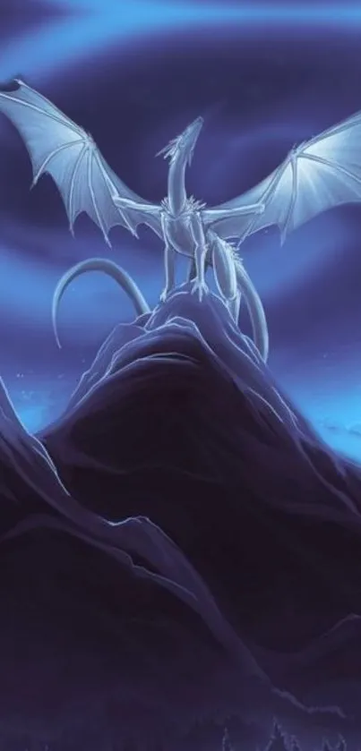 Mystical dragon on mountain under starry blue night sky.