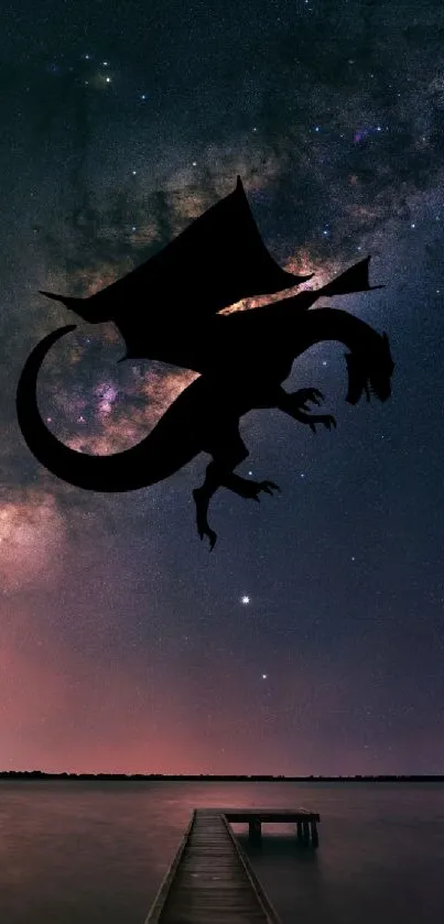 Dragon silhouette against a starry night sky above a tranquil lake.