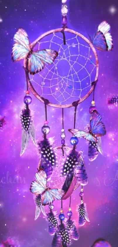 Dreamcatcher with butterflies on a purple cosmic backdrop.