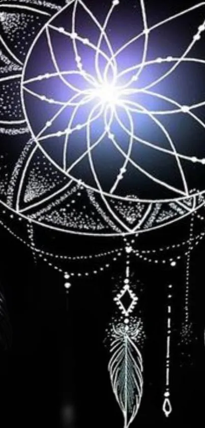 Mystical glowing dreamcatcher on a black background with feather details.