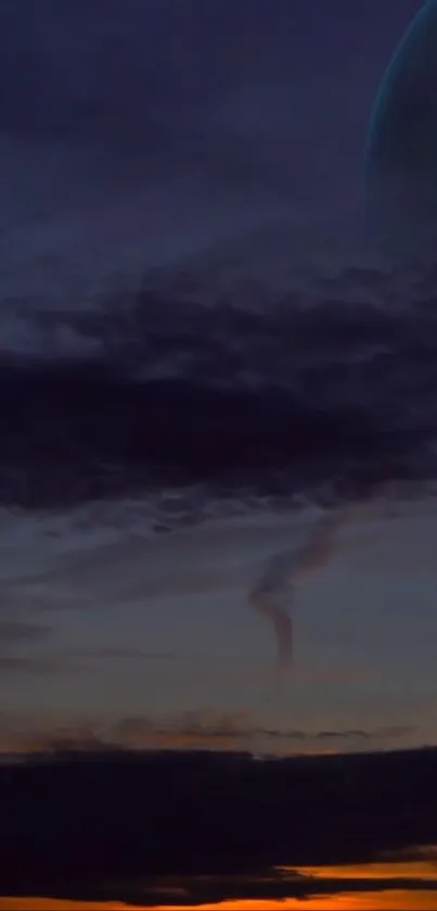 Mystical evening sky with dark clouds and a celestial glow.