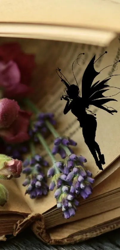 Silhouette of a fairy on an open book with lavender flowers.