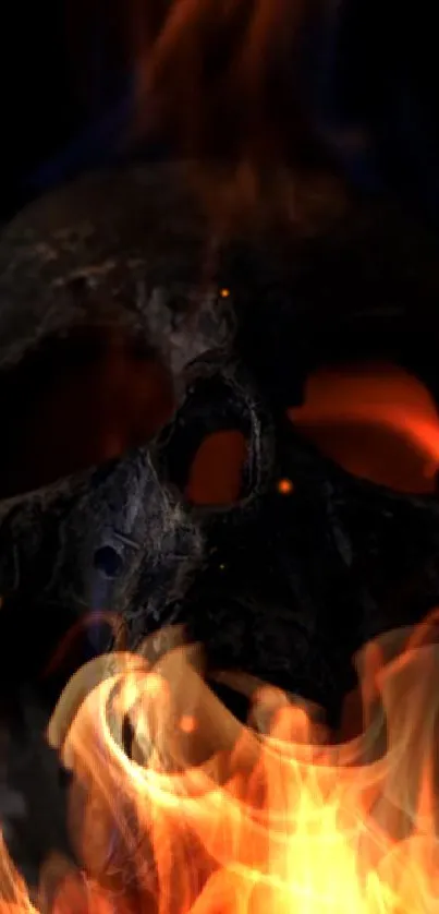 Fiery skull with glowing flames on a dark background.