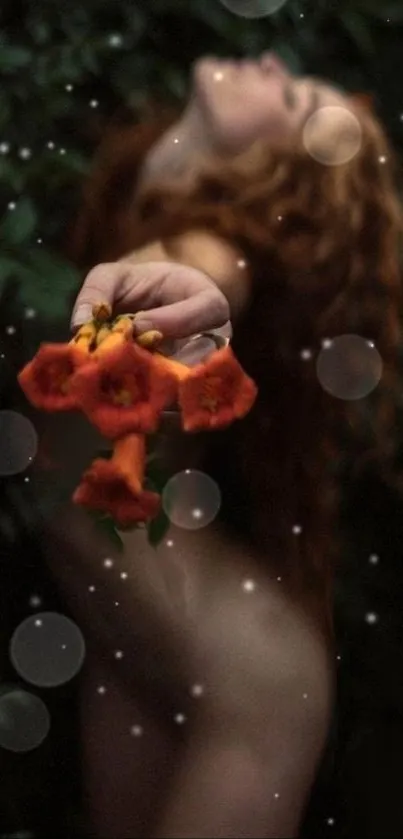 Woman holding orange flowers with mystical bokeh effect.